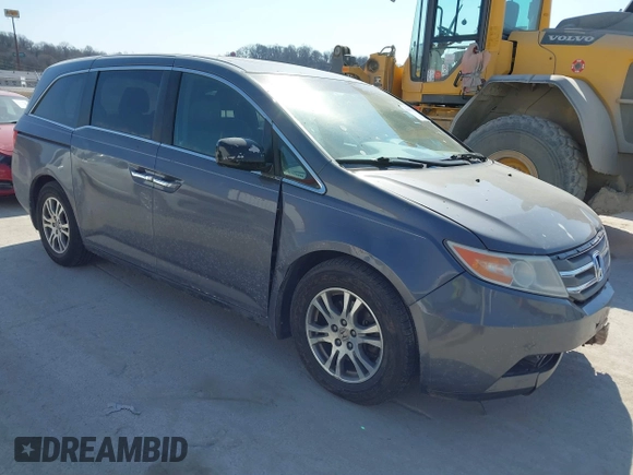 2012 Honda Odyssey EX-L with VIN 5FNRL5H69CB128585, listed as a IAAI auction lot 41695109 with 231,565 mi miles and . Bid and sale history available at carsss.com. Image 1.