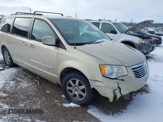 2011 Chrysler Town & Country Touring with VIN 2A4RR5DG8BR610779, listed as a IAAI auction lot 41235209 with 224,421 mi miles. Bid and sale history available at carsss.com. Image 1.