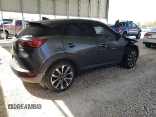 2019 Mazda CX-3 Touring z VIN JM1DKFC75K1439294, wystawiony jako Copart lot #52967955 z przebiegiem 16 966 mil mil oraz Czysty tytuł • Clean title. Historia ofert i sprzedaży dostępna na DreamBid. Obrazek 3.
