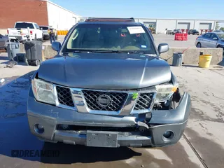 2005 Nissan Pathfinder SE with VIN 5N1AR18U45C751529, listed as a IAAI auction lot 41009894 with 167,023 mi miles. Bid and sale history available at carsss.com. Image 12.