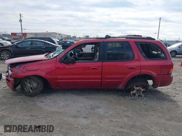 2002 Oldsmobile Bravada z VIN 1GHDT13S422393594, wystawiony jako IAAI lot #42150286 z przebiegiem 231 104 mil mil oraz . Historia ofert i sprzedaży dostępna na DreamBid. Obrazek 14.