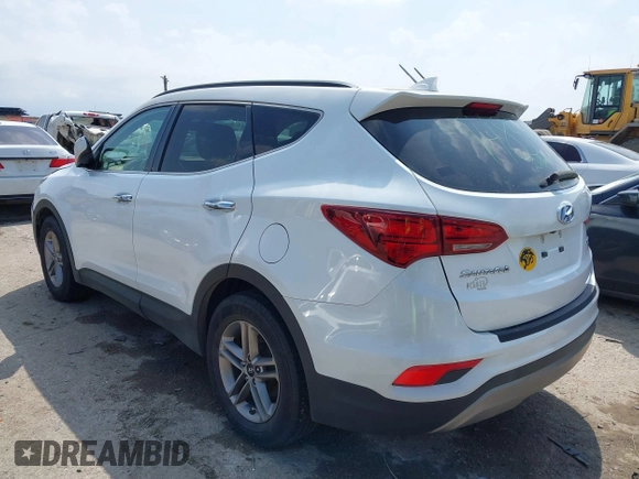 2018 Hyundai Santa Fe 2.4L z VIN 5NMZUDLB3JH055771, wystawiony jako IAAI lot #42126058 z przebiegiem 142 991 mil mil oraz . Historia ofert i sprzedaży dostępna na DreamBid. Obrazek 3.