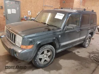 2010 Jeep Commander Sport z VIN 1J4RG4GT4AC139097, wystawiony jako IAAI lot #41080018 z przebiegiem 214 735 mil mil oraz . Historia ofert i sprzedaży dostępna na DreamBid. Obrazek 2.