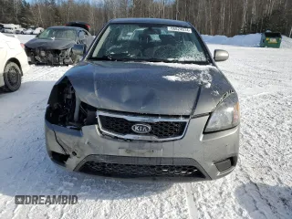 2011 Kia Rio with VIN KNADH4B32B6915325, listed as a Copart auction lot 86824074 with 167,410 mi miles and Salvage Title. Bid and sale history available at DreamBid. Image 5.