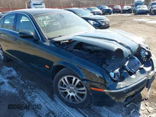 2005 Jaguar S-Type with VIN SAJWA01T95FN51551, listed as a IAAI auction lot 41637854 with 90,075 mi miles and . Bid and sale history available at DreamBid. Image 17.