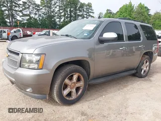 2007 Chevrolet Tahoe LT z VIN 1GNFC13007J351246, wystawiony jako IAAI lot #42270462 z przebiegiem 251 349 mil mil oraz . Historia ofert i sprzedaży dostępna na DreamBid. Obrazek 2.