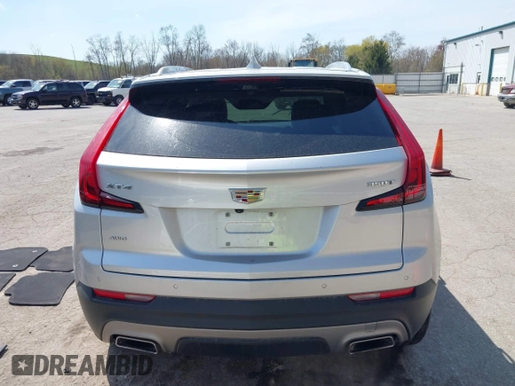 2022 Cadillac XT4 AWD Premium Luxury with VIN 1GYFZDR47NF157553, listed as a IAAI auction lot 42124860 with 7,560 mi miles and . Bid and sale history available at DreamBid. Image 17.