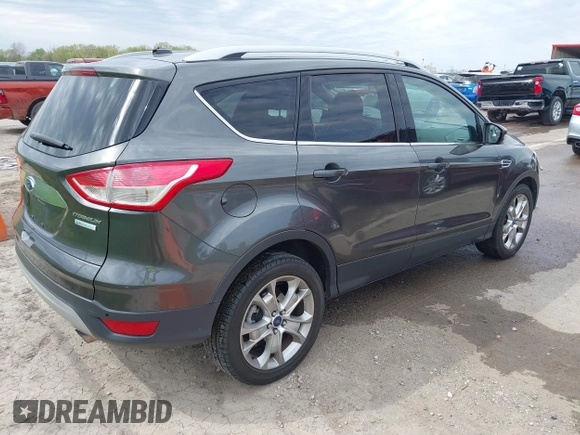 2015 Ford Escape Titanium with VIN 1FMCU0J90FUA25086, listed as a IAAI auction lot 41993681 with 126,170 mi miles. Bid and sale history available at carsss.com. Image 4.