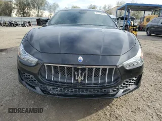 2018 Maserati Ghibli S Q4 z VIN ZAM57YTA4J1296684, wystawiony jako Copart lot #51278825 z przebiegiem 59 872 mil mil oraz Szkoda całkowita • Salvage title. Historia ofert i sprzedaży dostępna na DreamBid. Obrazek 5.