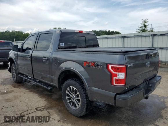 2018 Ford F-150 XL with VIN 1FTEW1EG7JFC40015, listed as a Copart auction lot 60659755 with 194,645 mi miles and Salvage title. Bid and sale history available at DreamBid. Image 2.
