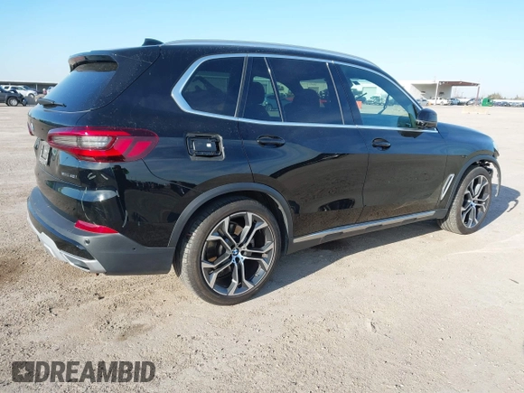 2021 BMW X5 sDrive40i with VIN 5UXCR4C03M9F14207, listed as a IAAI auction lot 41286501 with 41,679 mi miles and . Bid and sale history available at DreamBid. Image 4.