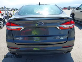 2019 Ford Fusion Titanium with VIN 3FA6P0D91KR104827, listed as a IAAI auction lot 42221526 with 141,316 mi miles and . Bid and sale history available at DreamBid. Image 16.