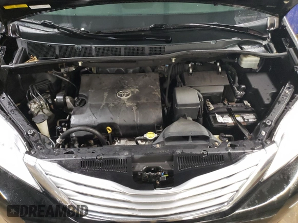 2011 Toyota Sienna XLE z VIN 5TDDK3DC6BS001431, wystawiony jako Copart lot #86715054 z przebiegiem 193 640 mil mil oraz Szkoda całkowita • Salvage title. Historia ofert i sprzedaży dostępna na DreamBid. Obrazek 11.
