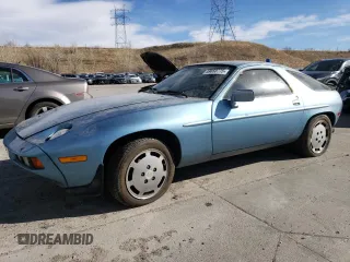 1985 Porsche 928 z VIN WP0JB092XFS860634, wystawiony jako Copart lot #49650775 z przebiegiem 140 644 mil mil oraz Tytuł czysty. Historia ofert i sprzedaży dostępna na DreamBid. Obrazek 1.