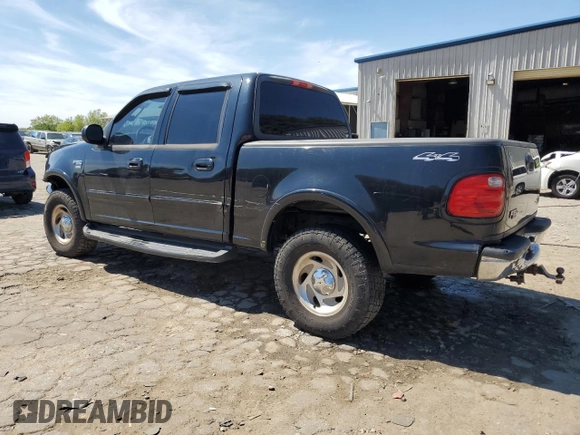 2003 Ford F-150 XLT with VIN 1FTRW08L63KB47470, listed as a Copart auction lot 50400055 with 223,859 mi miles and Salvage Title. Bid and sale history available at carsss.com. Image 2.