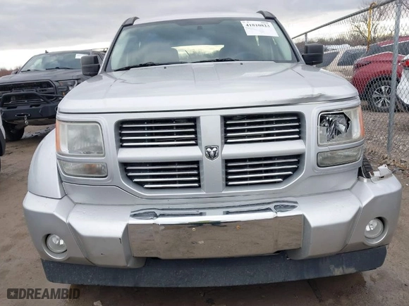 2011 Dodge Nitro Heat with VIN 1D4PU4GK6BW607590, listed as a IAAI auction lot 41810823 with 87,179 mi miles. Bid and sale history available at carsss.com. Image 12.
