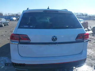 2021 Volkswagen Atlas SE z VIN 1V2WR2CA4MC514968, wystawiony jako IAAI lot #41414547 z przebiegiem 133 946 mil mil oraz . Historia ofert i sprzedaży dostępna na DreamBid. Obrazek 6.