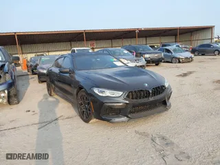 2020 BMW M8 with VIN WBSGV0C06LCD99264, listed as a IAAI auction lot 40276722 with 38,039 mi miles. Bid and sale history available at carsss.com. Image 1.