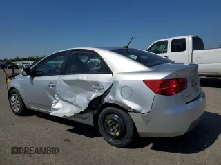 2010 Kia Forte EX z VIN KNAFU4A24A5054277, wystawiony jako Copart lot #56007995 z przebiegiem 218 782 mil mil oraz Szkody całkowita. Historia ofert i sprzedaży dostępna na DreamBid. Obrazek 2.