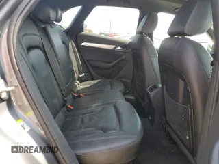 2015 Audi Q3 Prestige with VIN WA1GFCFS8FR009731, listed as a Copart auction lot 59897225 with 84,138 mi miles and Salvage title. Bid and sale history available at DreamBid. Image 11.