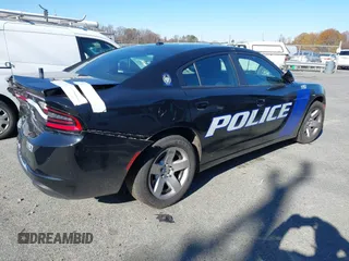 2022 Dodge Charger Police with VIN 2C3CDXAT3NH109952, listed as a IAAI auction lot 40919989 with 19,169 mi miles and . Bid and sale history available at DreamBid. Image 4.