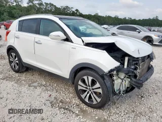 2013 Kia Sportage EX z VIN KNDPCCA29D7434437, wystawiony jako Copart lot #57657125 z przebiegiem 131 625 mil mil oraz Szkoda całkowita • Salvage title. Historia ofert i sprzedaży dostępna na DreamBid. Obrazek 4.