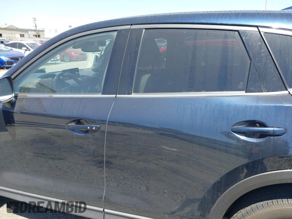 2023 Mazda CX-5 S Premium with VIN JM3KFBDM4P0185865, listed as a IAAI auction lot 42040234 with 32,761 mi miles and . Bid and sale history available at DreamBid. Image 15.