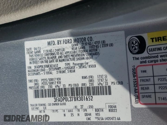 2011 Ford Fusion Hybrid with VIN 3FADP0L37BR301652, listed as a Copart auction lot 55696495 with 152,677 mi miles and Salvage title. Bid and sale history available at DreamBid. Image 12.