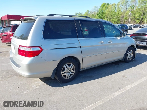 2006 Honda Odyssey EX-L with VIN 5FNRL38736B016026, listed as a IAAI auction lot 41971496 with 302,046 mi miles. Bid and sale history available at carsss.com. Image 4.