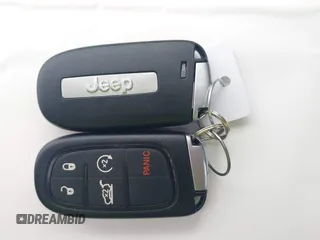2022 Jeep Cherokee Trailhawk z VIN 1C4PJMBX1ND500729, wystawiony jako IAAI lot #42235098 z przebiegiem 60 354 mil mil oraz . Historia ofert i sprzedaży dostępna na DreamBid. Obrazek 11.