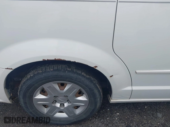 2012 Dodge Grand Caravan SE with VIN 2C4RDGBG8CR115003, listed as a IAAI auction lot 42217153 with 196,833 mi miles and . Bid and sale history available at DreamBid. Image 14.