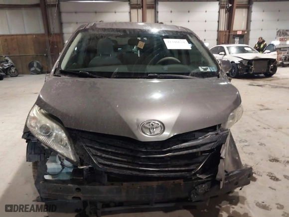 2011 Toyota Sienna LE AAS with VIN 5TDKK3DC0BS174711, listed as a IAAI auction lot 41340674 with 114,128 mi miles. Bid and sale history available at carsss.com. Image 12.