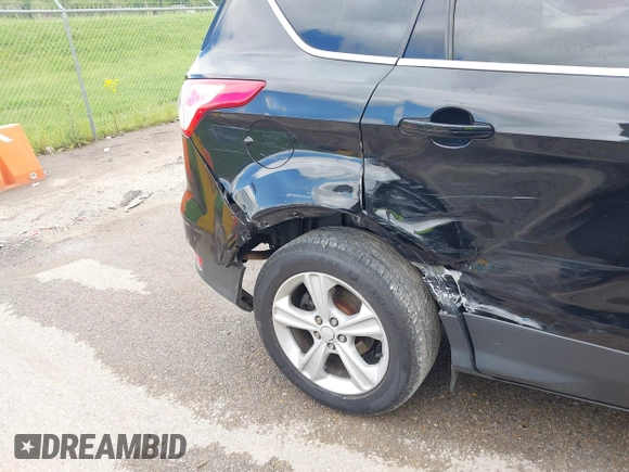 2013 Ford Escape SE z VIN 1FMCU9GX0DUB85914, wystawiony jako IAAI lot #42161300 z przebiegiem 185 255 mil mil oraz . Historia ofert i sprzedaży dostępna na DreamBid. Obrazek 6.