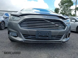 2013 Ford Fusion SE Hybrid z VIN 3FA6P0LUXDR181849, wystawiony jako IAAI lot #41949276 z przebiegiem 112 688 mil mil oraz . Historia ofert i sprzedaży dostępna na DreamBid. Obrazek 6.