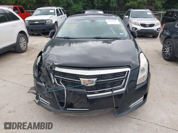2017 Cadillac XTS Luxury z VIN 2G61M5S32H9158776, wystawiony jako IAAI lot #42528442 z przebiegiem 90 680 mil mil oraz . Historia ofert i sprzedaży dostępna na DreamBid. Obrazek 11.