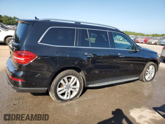 2017 Mercedes-Benz GLS 450 with VIN 4JGDF6EE9HA874694, listed as a Copart auction lot 69668974 with 128,694 mi miles and Salvage Title. Bid and sale history available at DreamBid. Image 3.