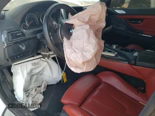2015 BMW M6 z VIN WBS6C9C51FD467998, wystawiony jako Copart lot #67775934 z przebiegiem Nie podano mil oraz Szkody całkowita. Historia ofert i sprzedaży dostępna na DreamBid. Obrazek 8.