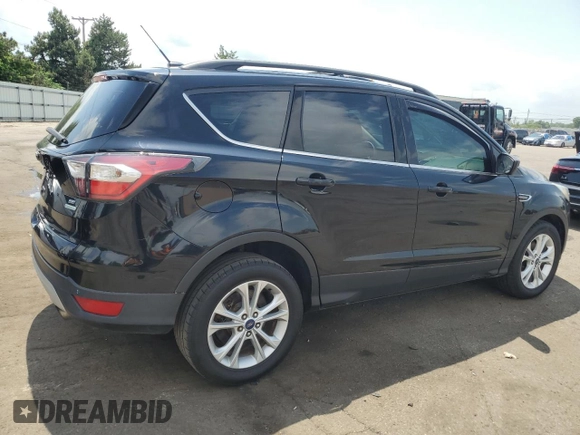2017 Ford Escape SE z VIN 1FMCU0GD5HUA47616, wystawiony jako Copart lot #57180915 z przebiegiem 193 358 mil mil oraz Czysty tytuł • Clean title. Historia ofert i sprzedaży dostępna na DreamBid. Obrazek 3.