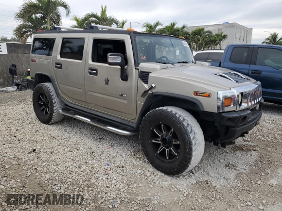 2006 Hummer H2 z VIN 5GRGN23U26H101561, wystawiony jako Copart lot #89308685 z przebiegiem 327 103 mil mil oraz Tytuł czysty. Historia ofert i sprzedaży dostępna na DreamBid. Obrazek 4.