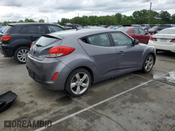 2013 Hyundai Veloster w/Red Int z VIN KMHTC6AD4DU088649, wystawiony jako Copart lot #58329295 z przebiegiem 174 798 mil mil oraz Czysty tytuł • Clean title. Historia ofert i sprzedaży dostępna na DreamBid. Obrazek 3.