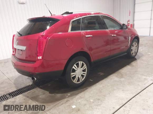 2011 Cadillac SRX Luxury Collection with VIN 3GYFNAEY8BS553596, listed as a IAAI auction lot 41286518 with 117,604 mi miles. Bid and sale history available at carsss.com. Image 4.