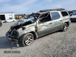 2004 GMC Envoy XL SLE with VIN 1GKET16S346115131, listed as a Copart auction lot 82677024 with 290,656 mi miles and Salvage Title. Bid and sale history available at carsss.com. Image 1.