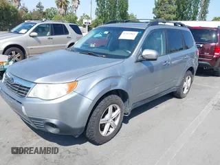 2009 Subaru Forester X with VIN JF2SH63669H716034, listed as a IAAI auction lot 42432811 with 192,094 mi miles and . Bid and sale history available at DreamBid. Image 2.