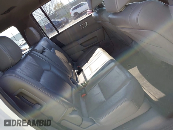 2012 Honda Pilot EX-L with VIN 5FNYF4H5XCB057255, listed as a IAAI auction lot 42001389 with 187,200 mi miles and . Bid and sale history available at DreamBid. Image 8.