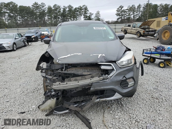 2017 Ford Escape SE with VIN 1FMCU0GD5HUC67421, listed as a Copart auction lot 86633734 with 82,929 mi miles and Salvage Title. Bid and sale history available at DreamBid. Image 5.