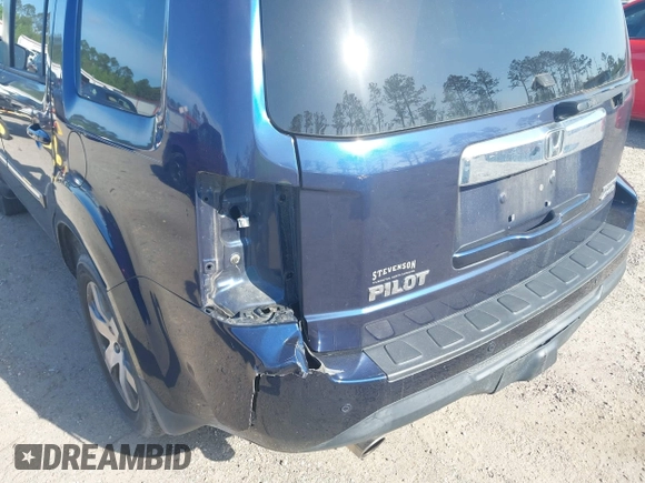 2014 Honda Pilot Touring with VIN 5FNYF4H92EB019248, listed as a IAAI auction lot 41942963 with 136,183 mi miles and . Bid and sale history available at carsss.com. Image 6.