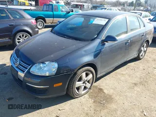 2008 Volkswagen Jetta SE with VIN 3VWRZ71K38M035479, listed as a IAAI auction lot 41399776 with 125,283 mi miles and . Bid and sale history available at DreamBid. Image 2.