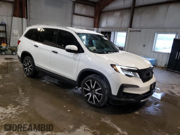 2019 Honda Pilot Touring 7-Passenger with VIN 5FNYF6H65KB049695, listed as a Copart auction lot 43444365 with 79,023 mi miles and Salvage Title. Bid and sale history available at DreamBid. Image 4.