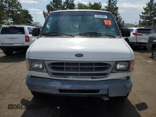 1999 Ford Econoline Cargo with VIN 1FTRE1429XHA29986, listed as a Copart auction lot 70331004 with 312,901 mi miles and Non Repairable. Bid and sale history available at carsss.com. Image 5.