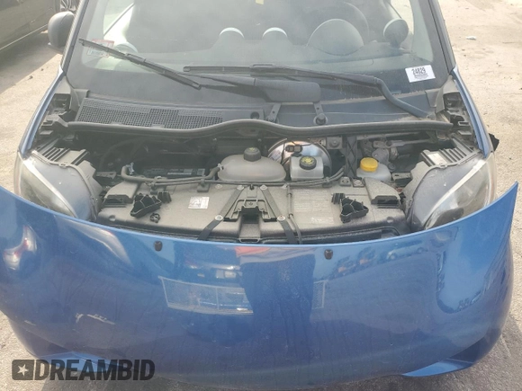 2016 Smart fortwo Passion z VIN WMEFJ5DA0GK076339, wystawiony jako Copart lot #68891564 z przebiegiem Nie podano mil oraz Szkoda całkowita • Salvage title. Historia ofert i sprzedaży dostępna na DreamBid. Obrazek 11.